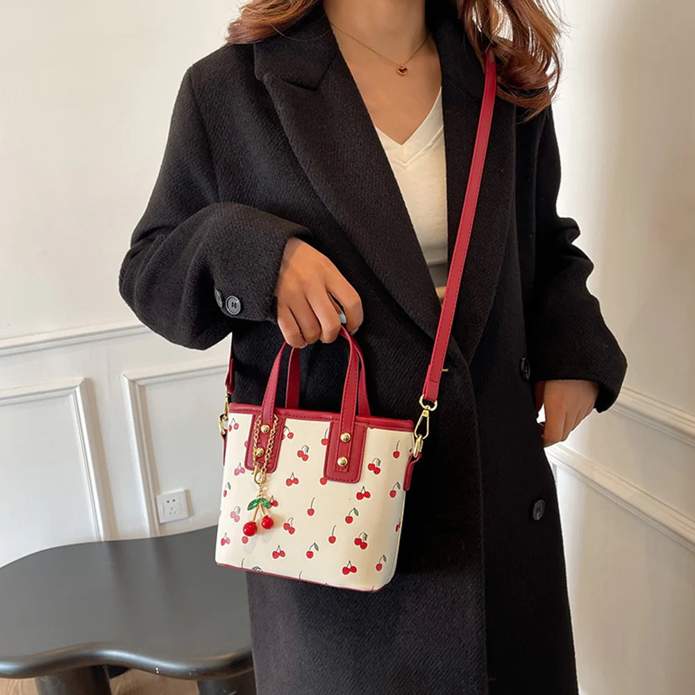 Women PU Cherry Shoulder Bag Large Capacity Trendy Commuting Bag with Cherry Pendant Stylish Crossbody Bag Aesthetic Handbag